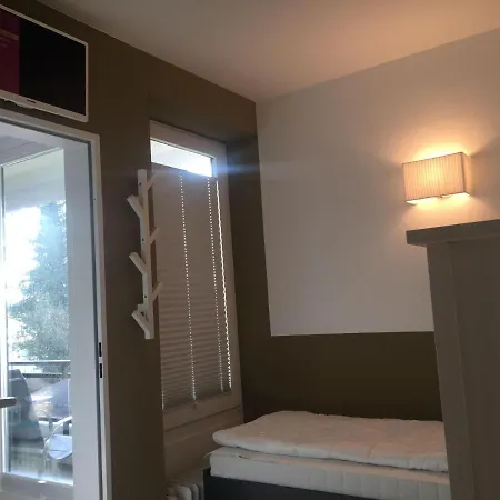 아파트 50-meter-bis-zum-strand-luetje-loge 티멘도르프스트랜드